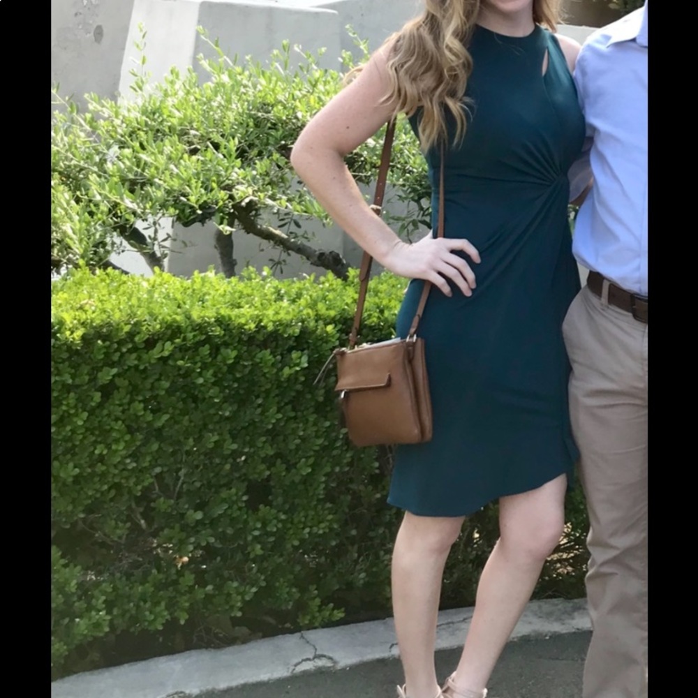 Catherine Maladrino teal knee-length dress.